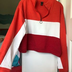 red, white, and orange quarter zip